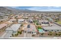 Areal view of the home featuring a private backyard pool and lush landscaping at 19806 W Marshall Ave, Litchfield Park, AZ 85340