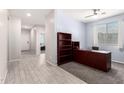 Office space featuring carpeted floors, neutral walls and a ceiling fan at 21648 W Ashleigh Marie St, Buckeye, AZ 85326
