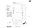 Detailed property plot showing building footprint, lot lines, and landscaping at 25138 W Chanute Pass, Buckeye, AZ 85326