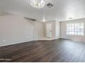Spacious living room with modern flooring and ample natural light at 3018 W Horsham Dr, Phoenix, AZ 85027