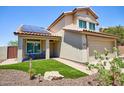 Charming two-story home featuring desert landscaping, a two car garage, and solar panels at 31256 N 40Th Pl, Cave Creek, AZ 85331