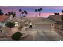 Charming single-story home featuring a desert-landscaped yard and attached two-car garage at 3394 N 147Th Ln, Goodyear, AZ 85395