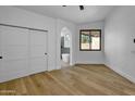 Bedroom featuring an ensuite bathroom and closet with sliding doors at 3440 E Southern Ave # 1107, Mesa, AZ 85204