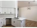 Bright kitchen featuring quartz counters, stainless steel appliances and a view of the dining area at 3440 E Southern Ave # 1107, Mesa, AZ 85204