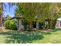 White home with mature landscaping, shrubs, and healthy green lawn at 3526 E Cheery Lynn Rd, Phoenix, AZ 85018