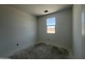 Bright bedroom with concrete floors, window with beautiful views and lots of natural light at 47706 W Moeller Rd, Maricopa, AZ 85139