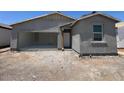 Newly constructed single-story home featuring an attached garage and a classic front door at 47706 W Moeller Rd, Maricopa, AZ 85139