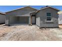 New construction features a modern exterior, two-car garage and stucco finish in a sunny neighborhood at 47706 W Moeller Rd, Maricopa, AZ 85139