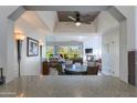 Inviting living room with golf course views, a cozy fireplace, and stylish decor at 6138 N 28Th St, Phoenix, AZ 85016