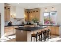 Spacious kitchen with a large island, modern cabinets, and stainless steel appliances at 9322 E Hidden Green Dr, Scottsdale, AZ 85262