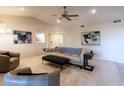 Cozy living room with plush seating, neutral colors, and ample natural light at 9745 N 95Th St # 227, Scottsdale, AZ 85258