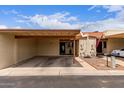 This home features a convenient carport and inviting curb appeal at 13408 N 25Th Dr, Phoenix, AZ 85029
