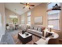 Stylishly furnished living room with a dining area, perfect for modern living at 3765 E Oxford Ln, Gilbert, AZ 85295