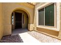 Inviting home entryway featuring a covered porch, security door, and a view to the interior at 4322 S Ranger Trl, Gilbert, AZ 85297