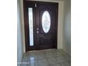 Elegant front door featuring decorative glass and dark wood finish, welcoming guests into the home at 740 N Oracle --, Mesa, AZ 85203