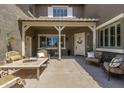 Inviting front porch with comfortable seating, perfect for relaxing and enjoying the outdoors at 6235 S Odessa Dr, Gilbert, AZ 85298