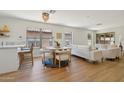 Bright living room boasts wood floors, modern decor, and plenty of natural light at 7500 E Deer Valley Rd # 132, Scottsdale, AZ 85255