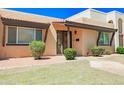 Inviting single story home featuring low maintenance landscaping and charming walkway at 1726 W Claremont St, Phoenix, AZ 85015
