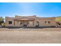 Charming single-story home with desert landscaping, decorative wrought iron door and spacious front yard at 2731 W Desert Ranch Rd, Phoenix, AZ 85086