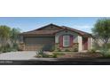 Charming single-story home with a two-car garage and desert landscaping at 2735 W La Mirada Dr, Laveen, AZ 85339