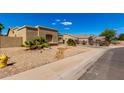 Single-story home with desert landscaping at 870 E Megan St, Gilbert, AZ 85295