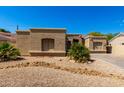 Single-story home with desert landscaping at 870 E Megan St, Gilbert, AZ 85295