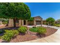 Charming single-story home boasting a well-manicured yard with desert landscaping at 30135 N 129Th Gln, Peoria, AZ 85383