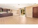 Bright living room featuring hardwood floors and an open layout at 3443 E Jasper Dr, Gilbert, AZ 85296