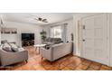 Cozy living room featuring comfortable seating and a ceiling fan at 4702 W Northview Ave, Glendale, AZ 85301