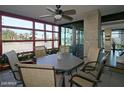 Relaxing patio with comfortable seating, fan, and city views at 4808 N 24Th St # 204, Phoenix, AZ 85016