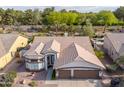 Charming home with well-manicured landscaping, a spacious three-car garage, and inviting curb appeal at 835 W Beechnut Dr, Chandler, AZ 85248