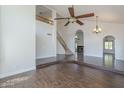 Spacious living area highlighting hardwood floors, an open staircase, and recessed lighting at 15828 N 10Th Pl, Phoenix, AZ 85022