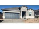 Beautiful single-story home featuring a well-manicured lawn, neutral paint scheme, and a two-car garage at 25484 W Graham Trl, Buckeye, AZ 85326