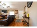 Cozy living room featuring a ceiling fan, modern furniture, and natural light at 501 E Ray Rd # 36, Chandler, AZ 85225
