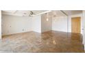 Bright, open living room featuring travertine floors, modern lighting, and neutral decor at 7157 E Rancho Vista Dr # 5004, Scottsdale, AZ 85251