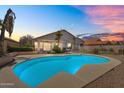 Inviting backyard oasis featuring a private pool, perfect for relaxation and outdoor enjoyment at 7464 E Lompoc Ave, Mesa, AZ 85209
