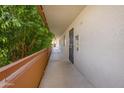 This community has well-maintained hallways and walkways with mature trees and landscaping at 7625 E Camelback Rd # B244, Scottsdale, AZ 85251