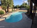 Private backyard pool featuring a well-maintained pool deck, perfect for outdoor enjoyment and entertaining at 8146 N 17Th Dr, Phoenix, AZ 85021
