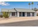 Inviting single-story home with xeriscaped front yard and attached two-car garage at 1416 W Highland St, Chandler, AZ 85224