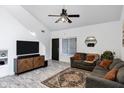 Inviting living room with a vaulted ceiling, ceiling fan, and stylish décor at 2201 N Comanche Dr # 1093, Chandler, AZ 85224