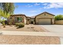 Charming single-Gathering home with desert landscaping and a three car garage at 32819 N 23Rd Ave, Phoenix, AZ 85085