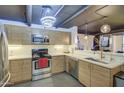 Modern kitchen with stainless steel appliances, sleek countertops, and ample cabinet space at 535 W Thomas Rd # 513, Phoenix, AZ 85013