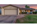 Charming single-Gathering home featuring a well-maintained lawn and a two-car garage at 5529 W Villa Maria Dr, Glendale, AZ 85308