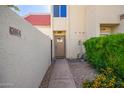 Inviting front entrance with well-maintained landscaping and desert-style architecture at 6004 N 79Th St, Scottsdale, AZ 85250