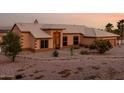 Attractive single-story home showcasing desert landscaping, a welcoming entrance, and a tile roof at 8351 S Summit Dr, Casa Grande, AZ 85193