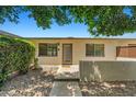 A charming single-story home featuring a private entrance and well-maintained landscaping at 1850 E Maryland Ave # 18, Phoenix, AZ 85016