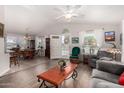Spacious open concept living and dining area with ample natural light and neutral colors at 201 S Greenfiled Rd -- # 199, Mesa, AZ 85206