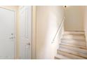 Bright entryway featuring a staircase and door, offering a welcoming entrance at 2401 E Rio Salado Pkwy # 1055, Tempe, AZ 85288