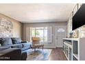Inviting living room with stylish furniture, natural light, and elegant decor at 2715 E Edgemont Ave, Phoenix, AZ 85008