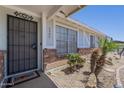 Inviting front entry featuring a security door and desert-friendly landscaping at 3362 E Carol Ave, Mesa, AZ 85204